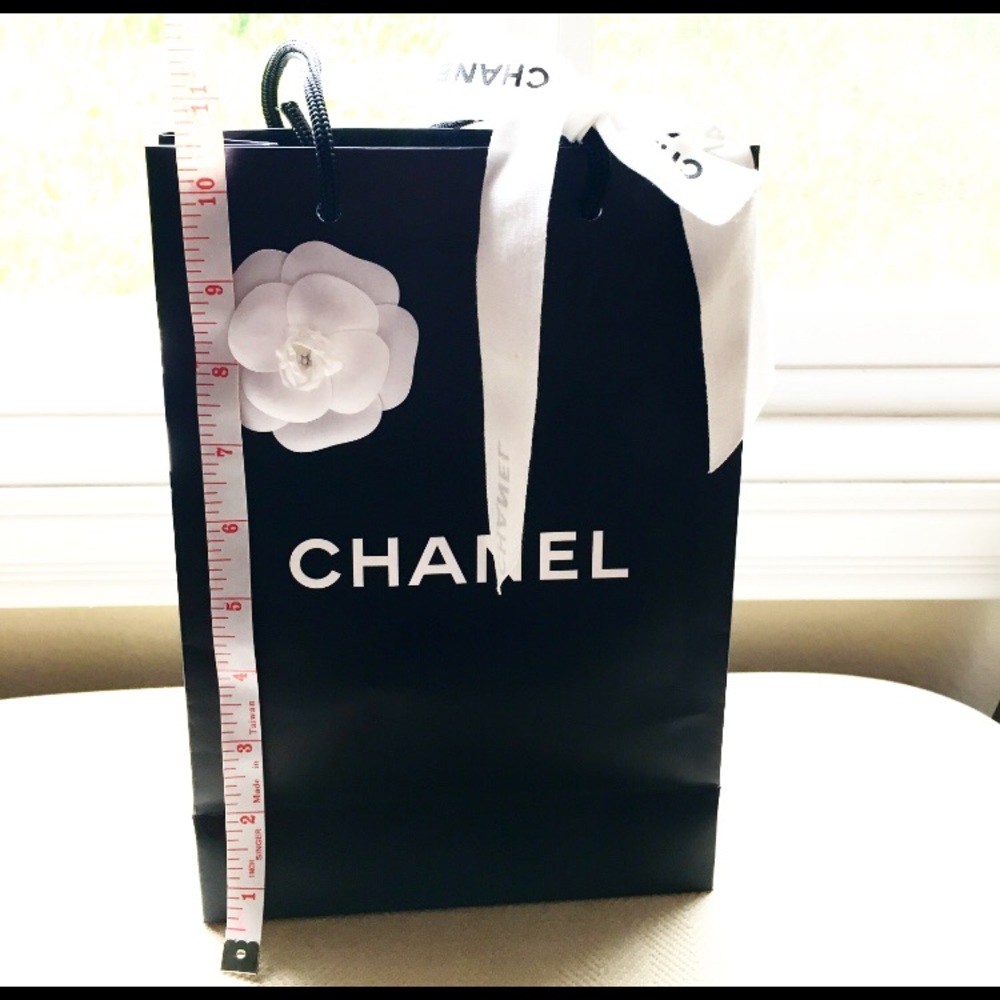 Chanel paper bag for small leather goods.